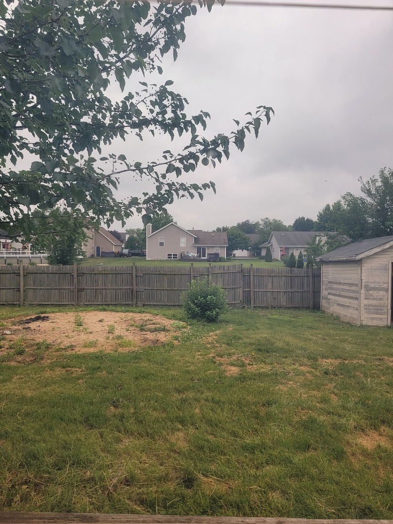 614 Bayfield Road Rockton, IL 61072 - Photo 40 of 42 a view of a yard with a house