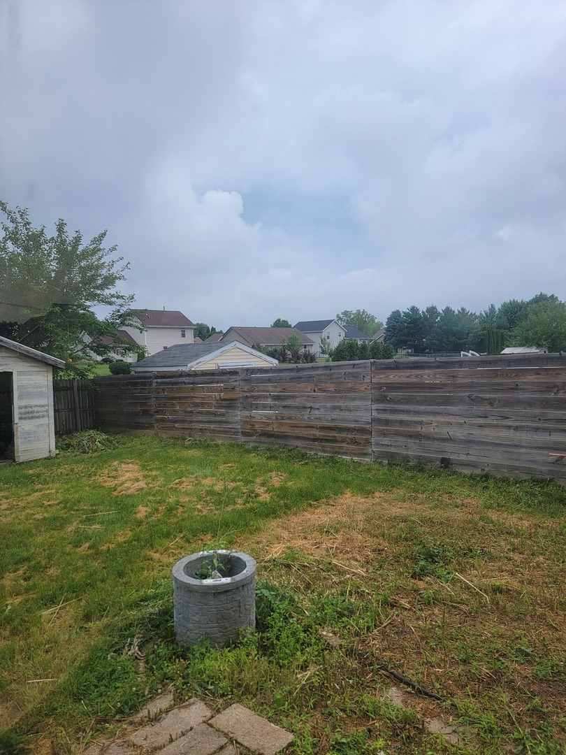 614 Bayfield Road Rockton, IL 61072 - Photo 42 of 42 a view of a lake with a big yard