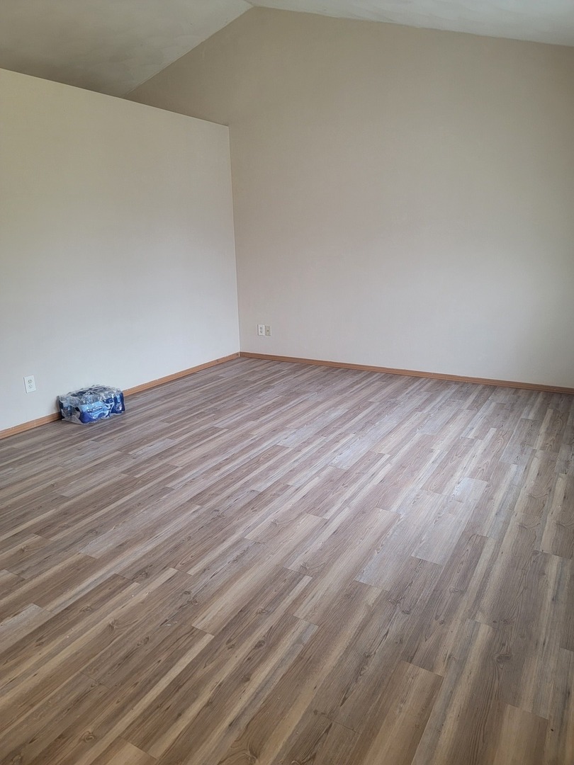 614 Bayfield Road Rockton, IL 61072 - Photo 5 of 42 a view of empty room with wooden floor