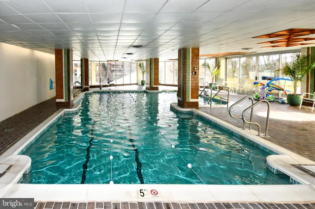 a black and white photo of a living room