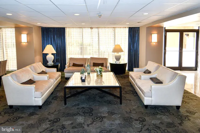 a view of a living room and bathroom