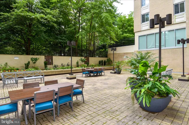 a view of a swimming pool with a patio