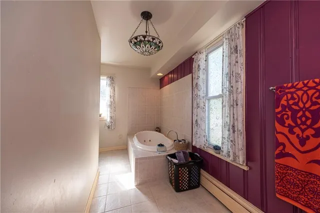 a bed room with a bed and a window