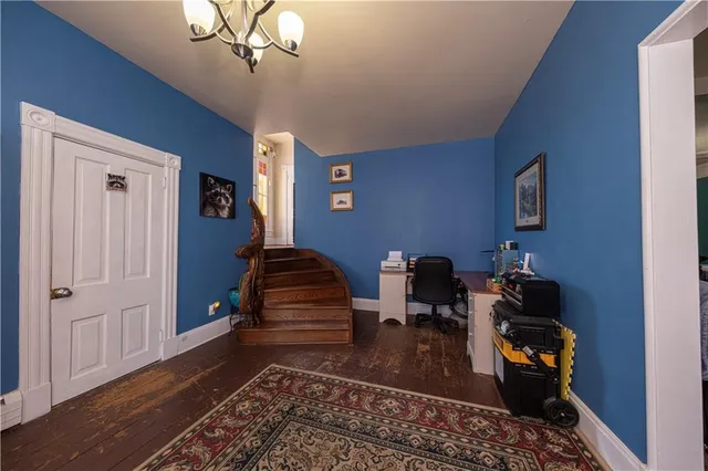 a living room with furniture and a rug