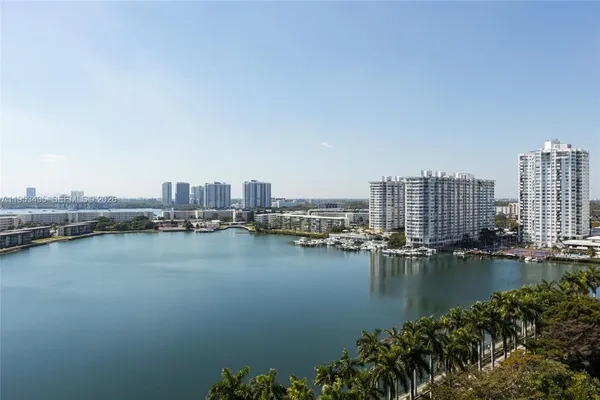 a view of a ocean with tall building