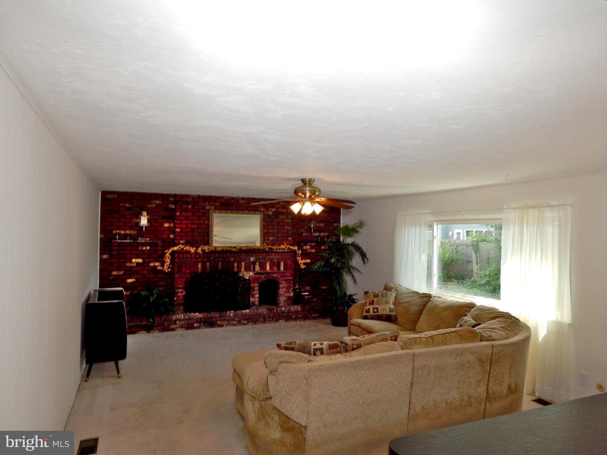 506 Barbara Road Fairless Hills, PA 19030 - Photo 8 of 25 Family Room with Wood Burning Fireplace