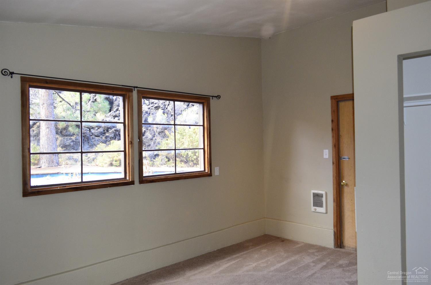 60197 Turquoise Road Bend, OR 97702 - Photo 11 of 23 Bedroom 2 off kitchen/laundry which look