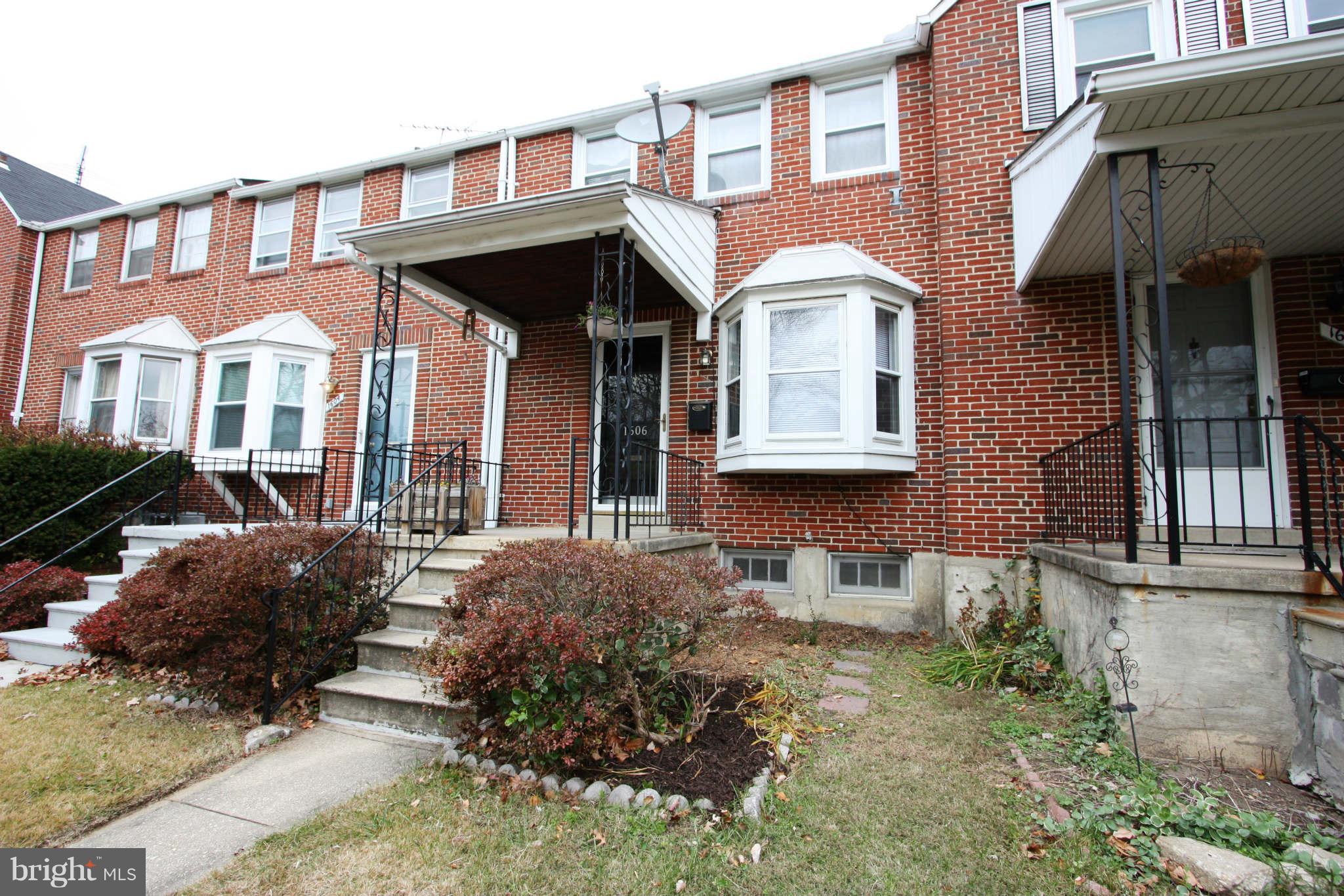1606 Aberdeen Road Towson, MD 21286 - Photo 2 of 30 a front view of a house with a yard