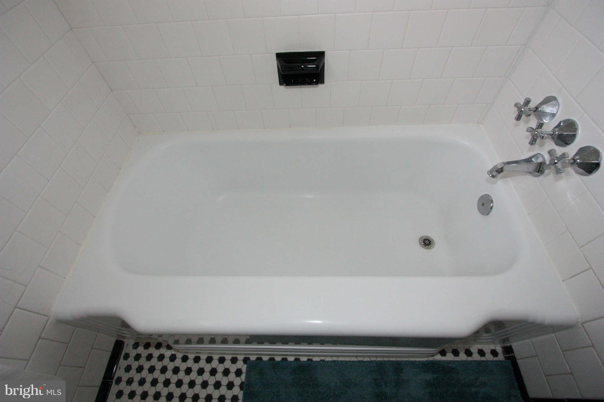 1606 Aberdeen Road Towson, MD 21286 - Photo 16 of 30 a bathroom with a bathtub