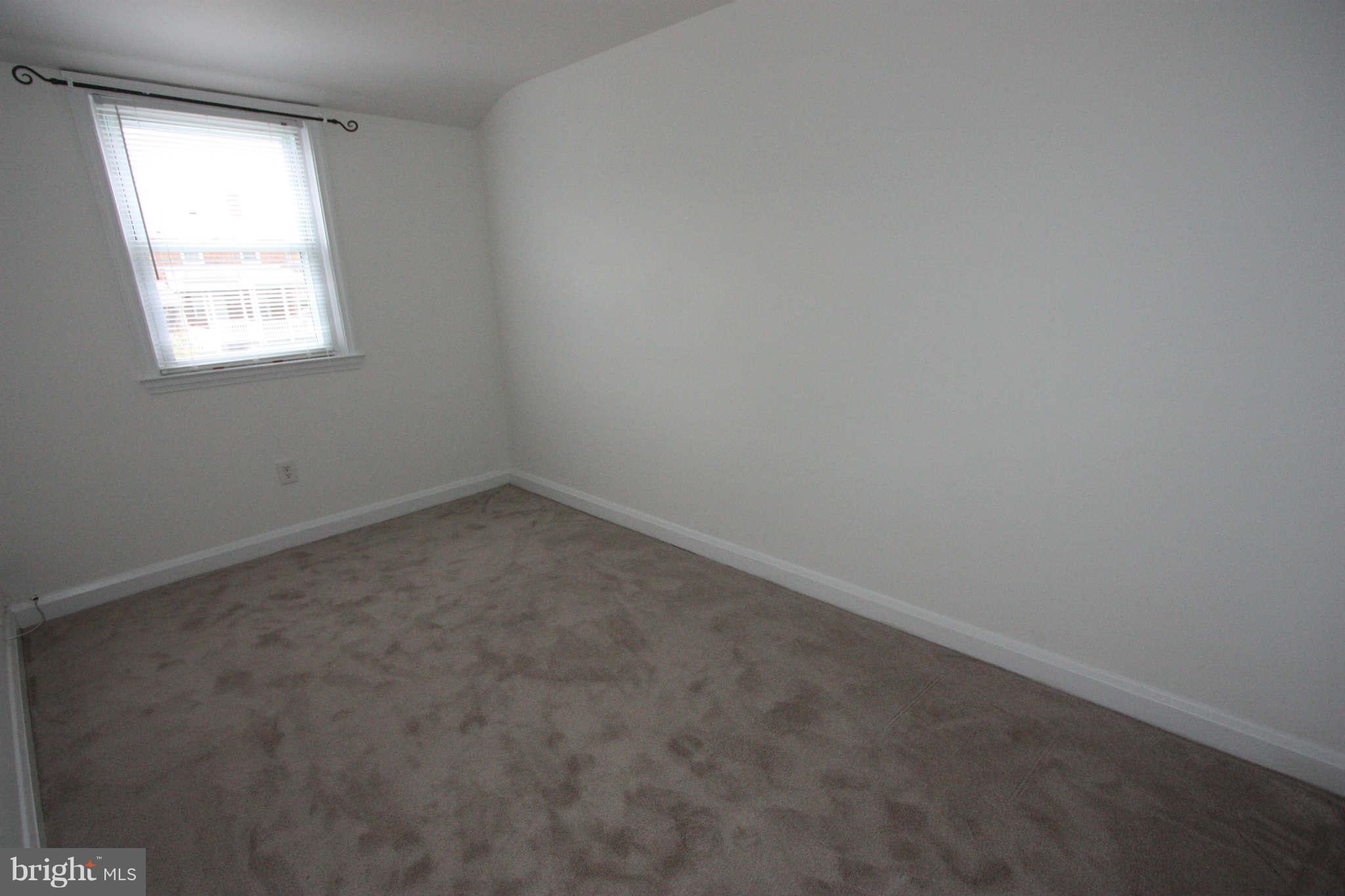 1606 Aberdeen Road Towson, MD 21286 - Photo 18 of 30 an empty room with a window