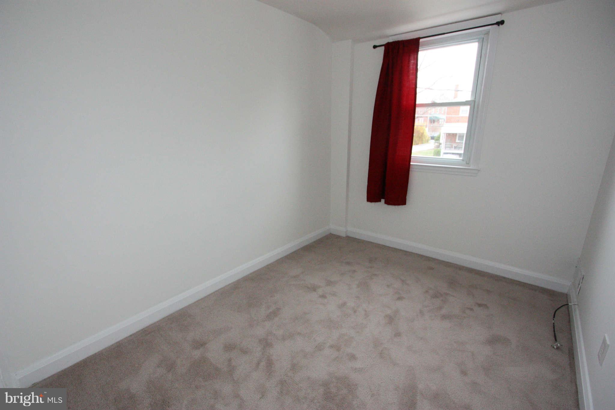 1606 Aberdeen Road Towson, MD 21286 - Photo 19 of 30 an empty room with windows