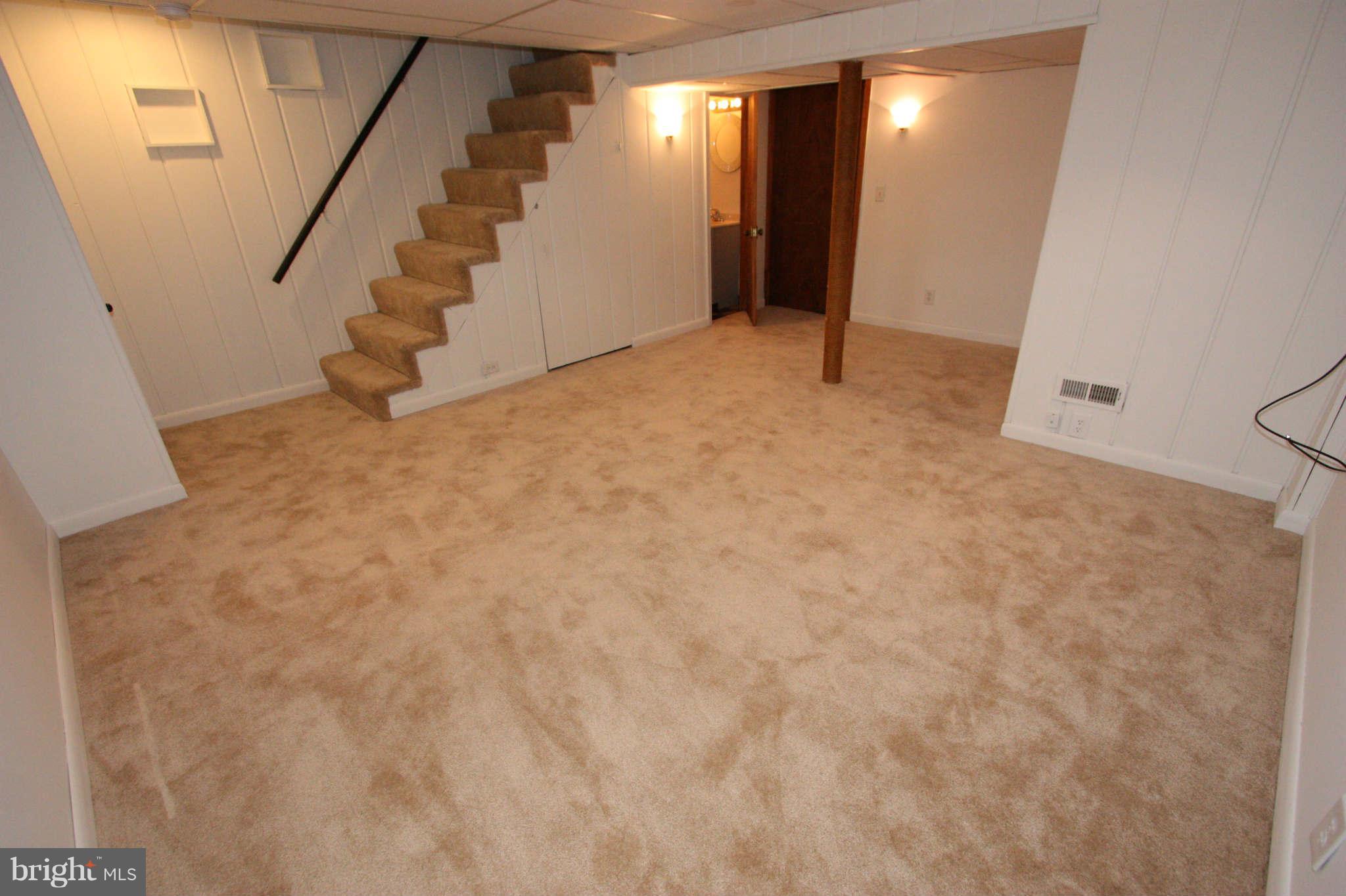 1606 Aberdeen Road Towson, MD 21286 - Photo 22 of 30 a view of an empty room with stairs
