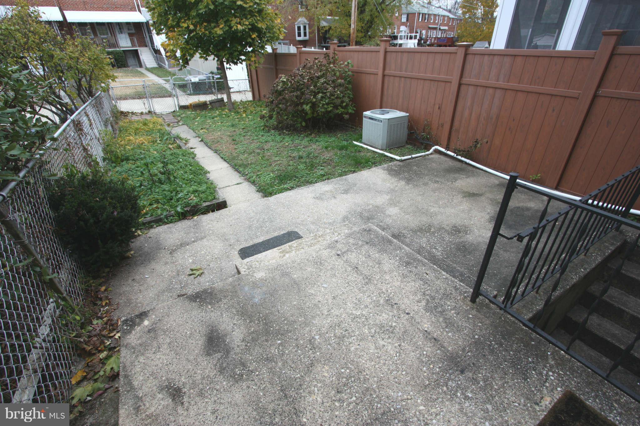 1606 Aberdeen Road Towson, MD 21286 - Photo 24 of 30 a view of a backyard with plants and trees