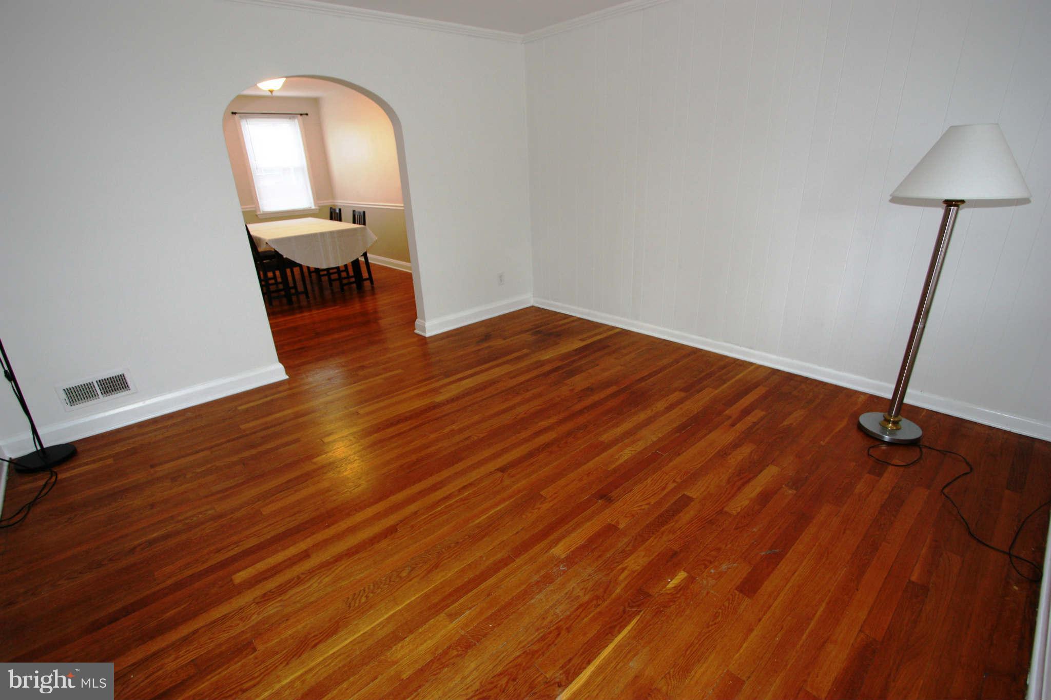 1606 Aberdeen Road Towson, MD 21286 - Photo 10 of 30 a view of a room with wooden floor table and chair