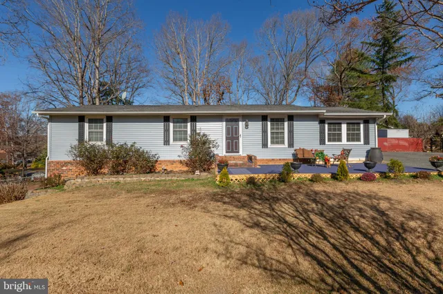 front view of a house with a small yard