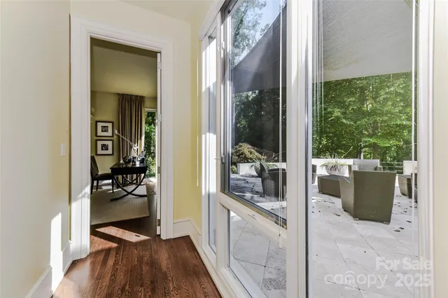 a view of a living room filled with furniture
