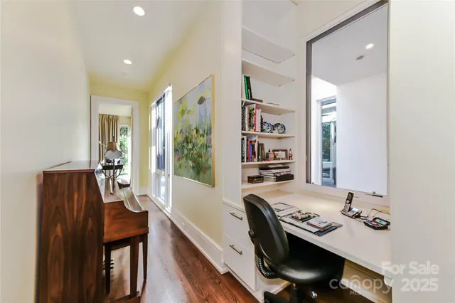 a view of a workspace with furniture and toys