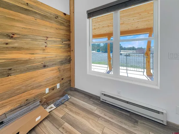 a view of a room with a large window