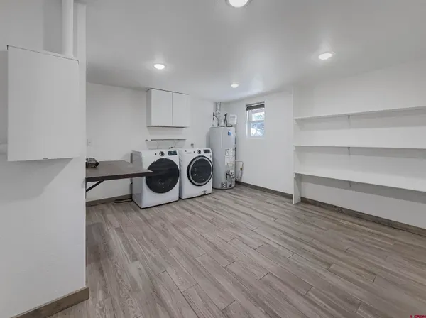 a view of kitchen and wooden floor