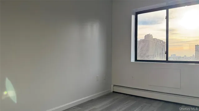 a view of an empty room and window