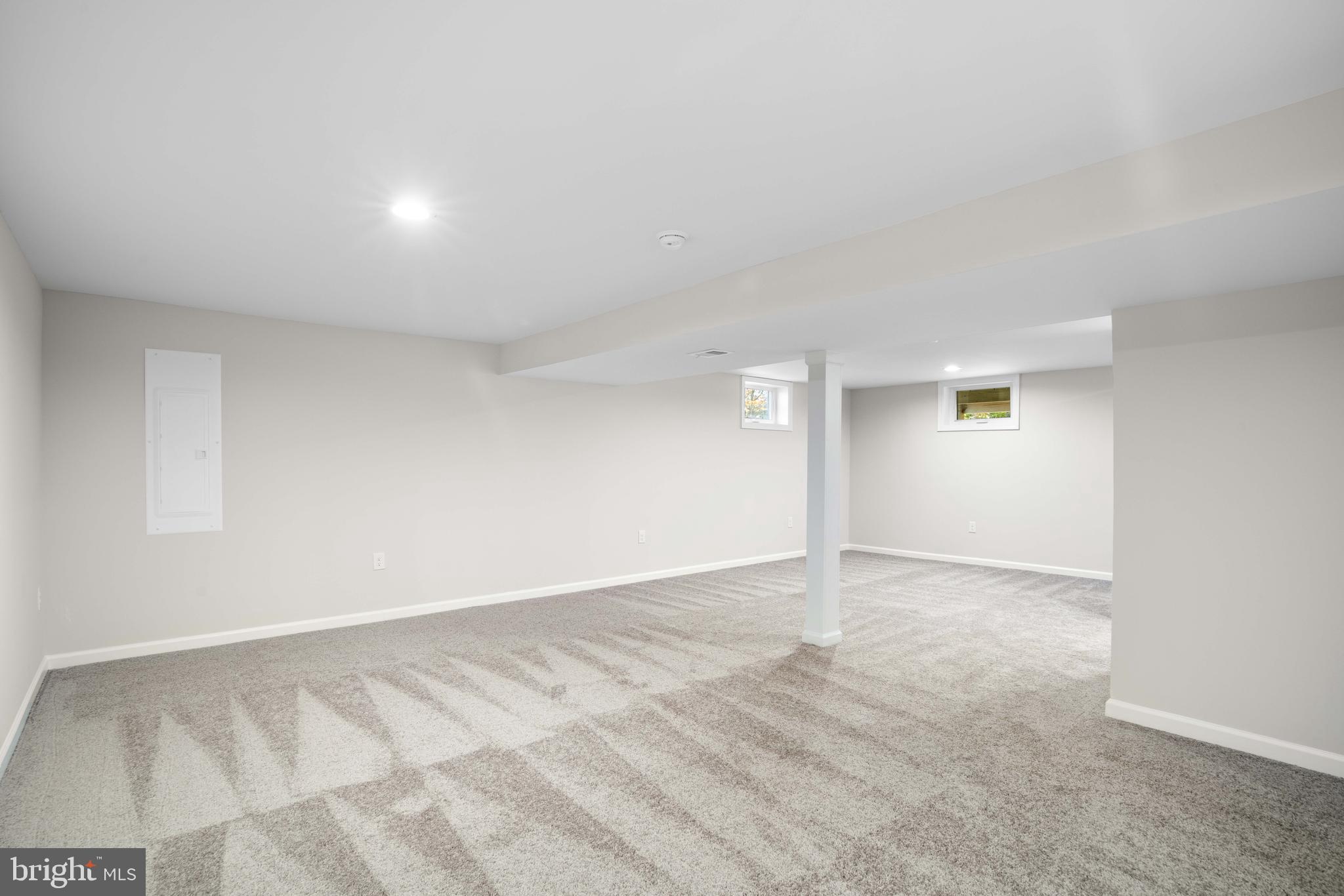 15388 Point Lookout Road St. Inigoes, MD 20684 - Photo 21 of 29 an empty room with a natural light