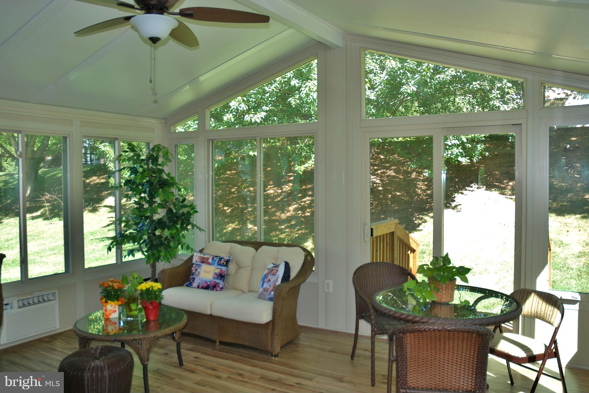 13809 Turnmore Road Silver Spring, MD 20906 - Photo 11 of 28 Sunroom with Gas Fireplace & Fan