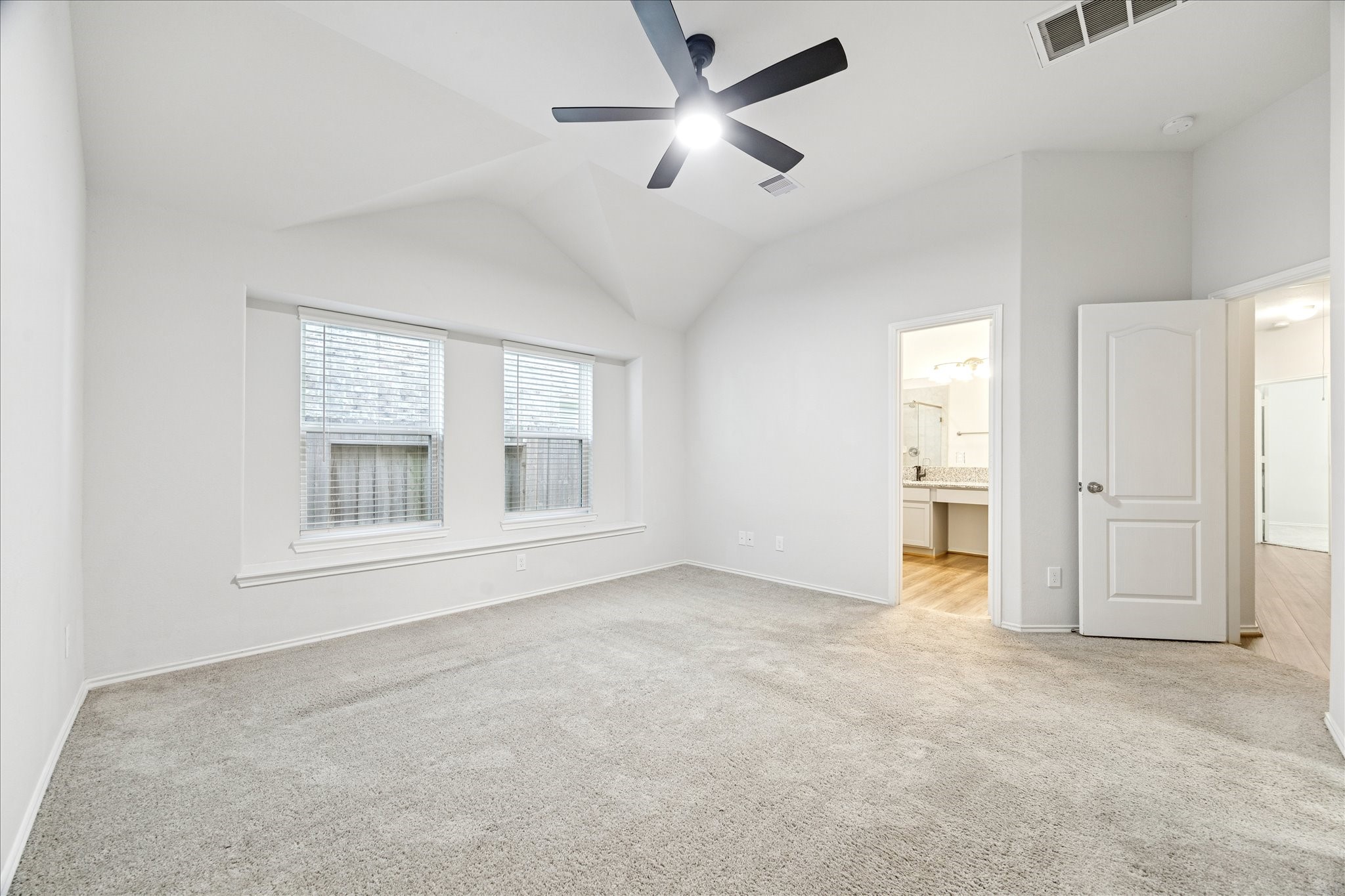 10318 Muir Bend Drive Rosharon, TX 77583 - Photo 8 of 10 a view of an empty room with a window