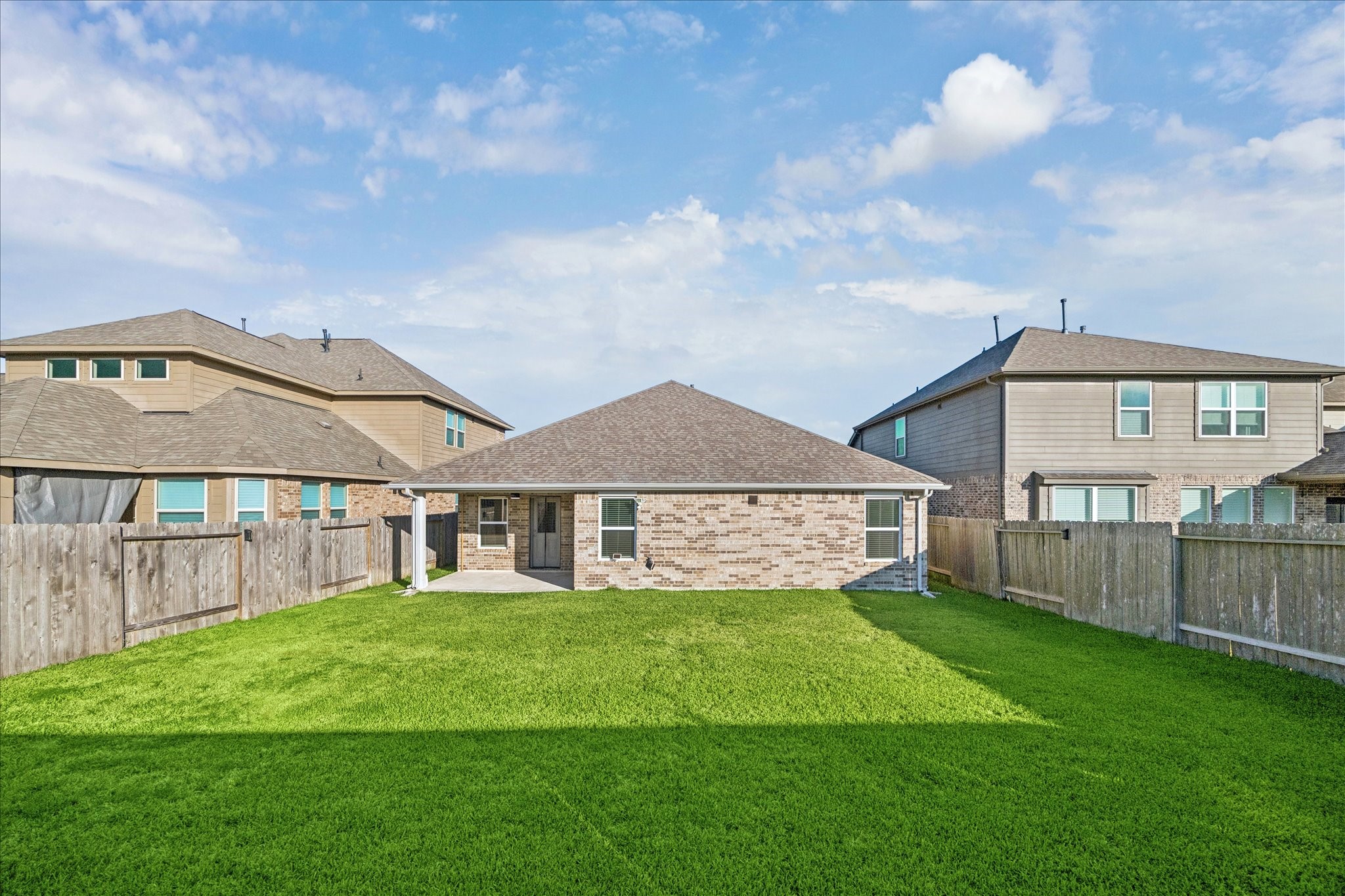 10318 Muir Bend Drive Rosharon, TX 77583 - Photo 10 of 10 a view of a house with a big yard and large trees