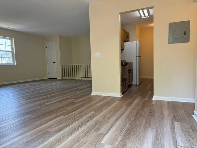 a view of balcony with wooden floor and floor