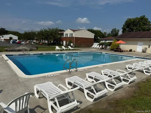a kitchen with wooden floors and a stove