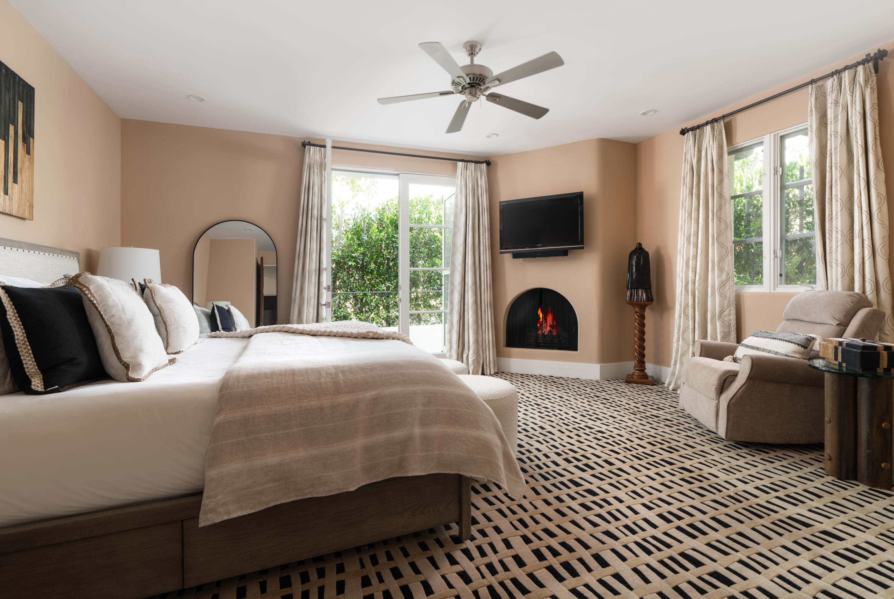 485 Monarch Lane Montecito, CA 93108 - Photo 11 of 28 a bedroom with a bed and a flat screen tv