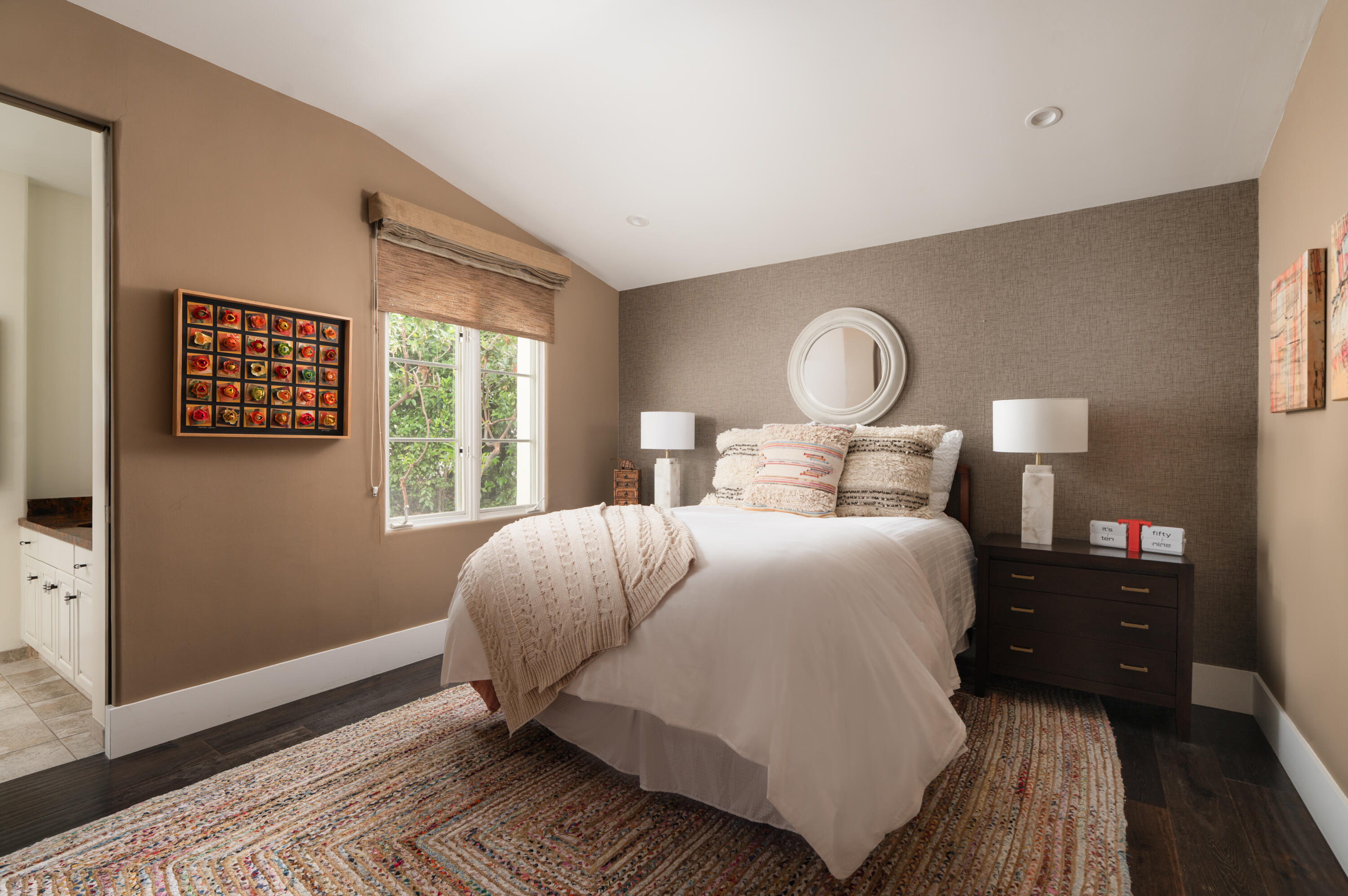 485 Monarch Lane Montecito, CA 93108 - Photo 13 of 28 a bedroom with a bed and window