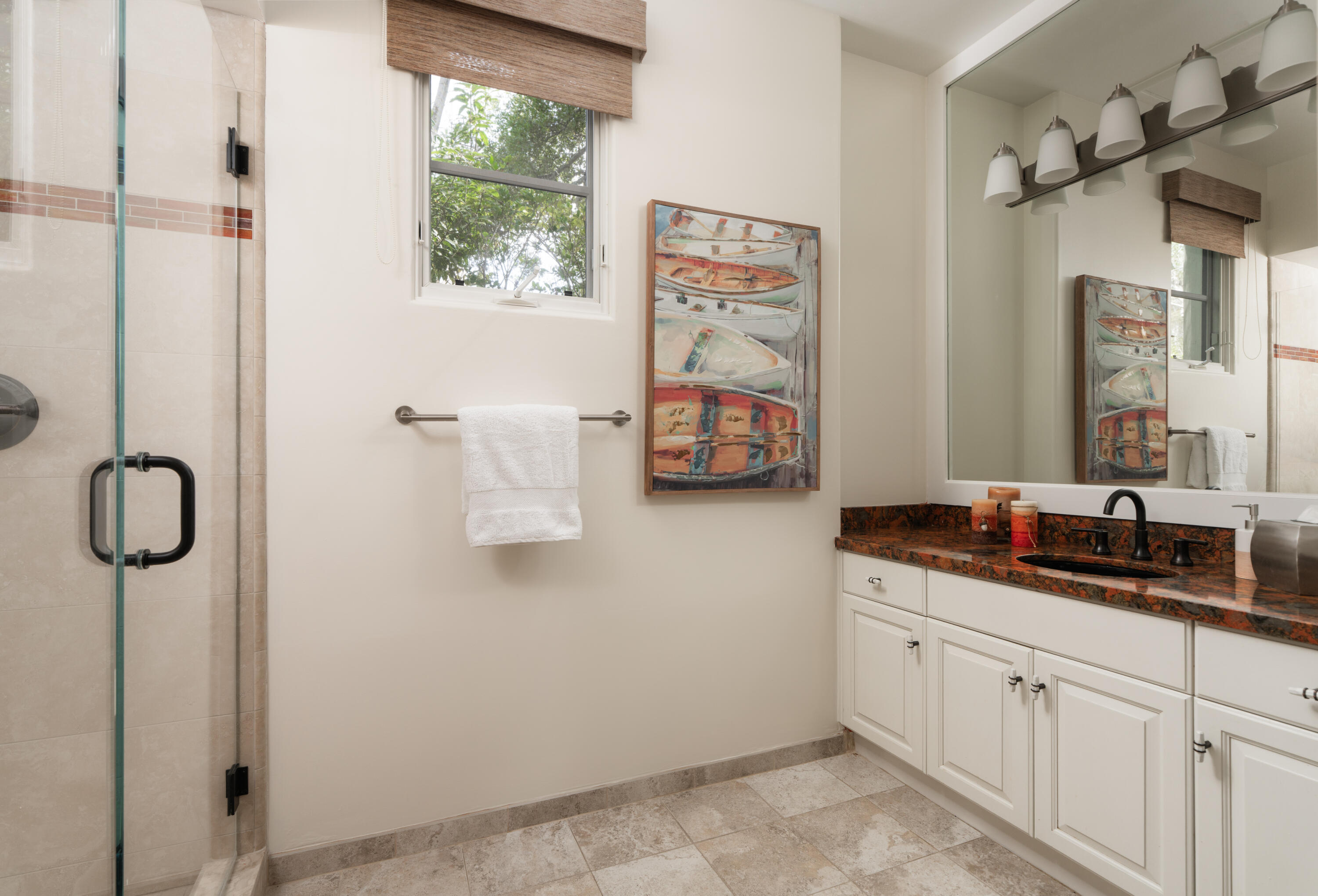 485 Monarch Lane Montecito, CA 93108 - Photo 15 of 28 a bathroom with a granite countertop sink a mirror and window