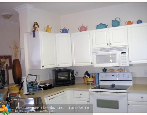 4402 Southwest 160th Avenue, Unit 918 Miramar, FL 33027 - Photo 12 of 15 Kitchen