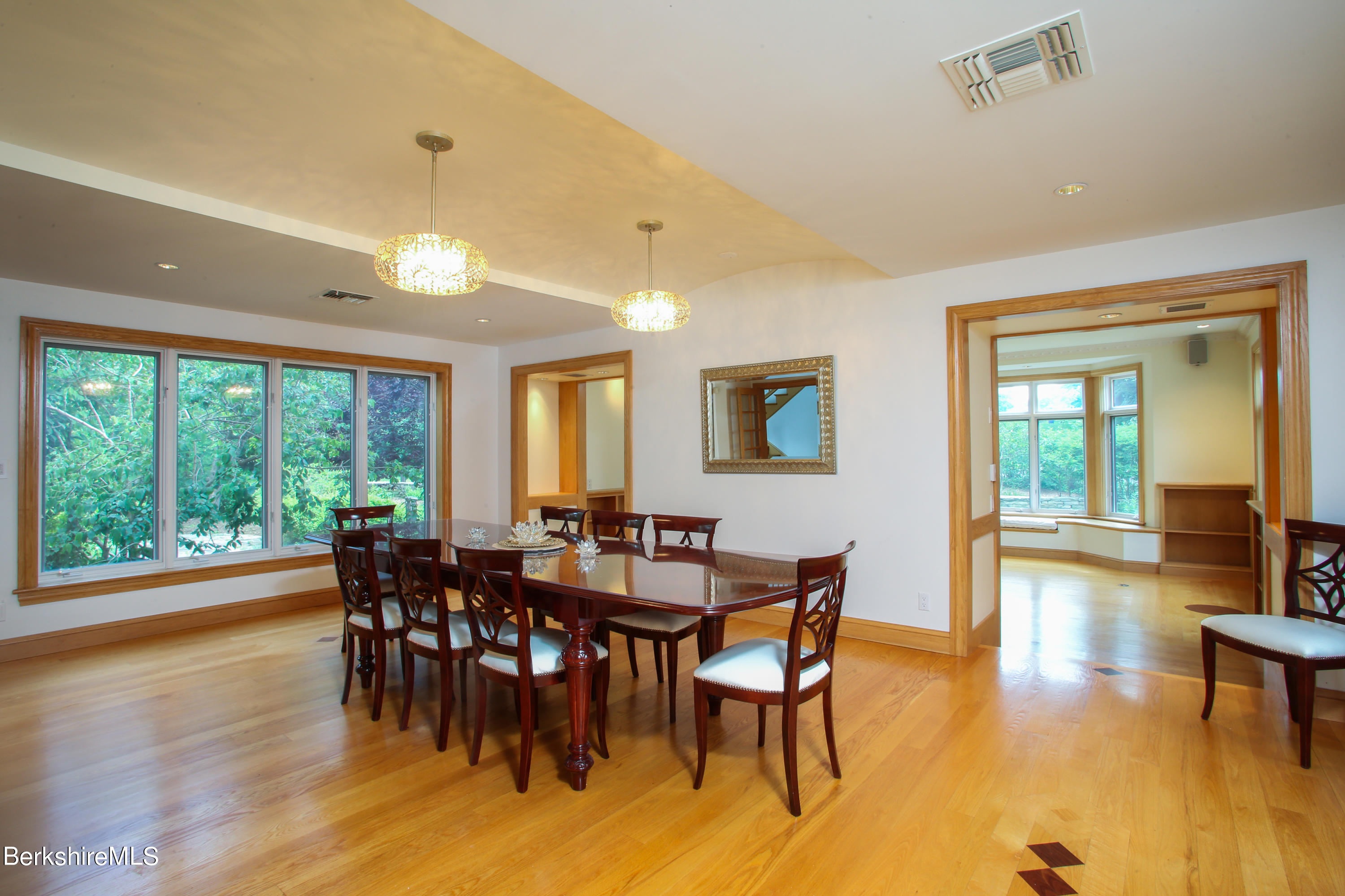 16 High Meadow Road Northampton, MA 01062 - Photo 12 of 49 a view of a dining room with furniture window and wooden floor