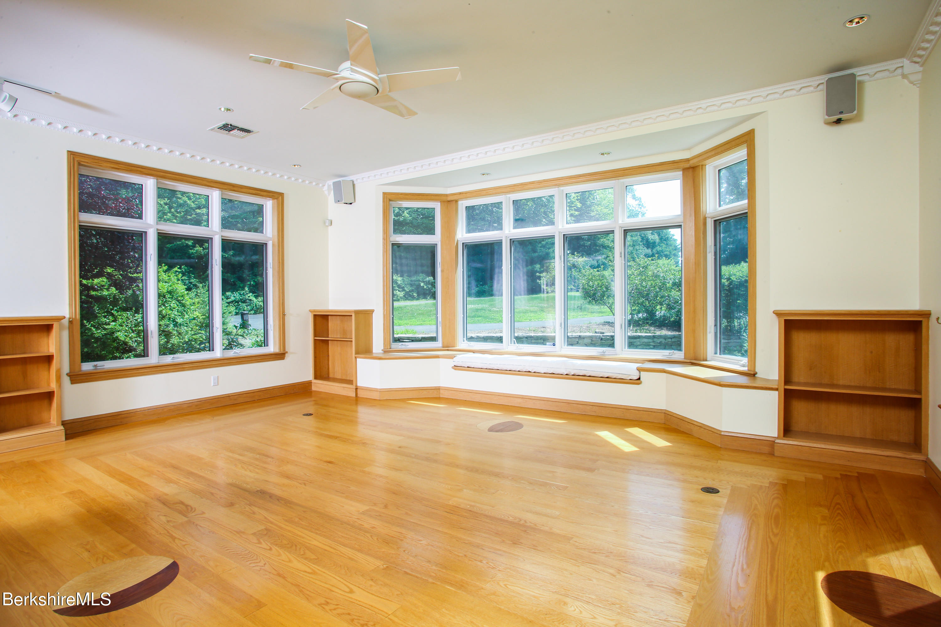 16 High Meadow Road Northampton, MA 01062 - Photo 15 of 49 a view of an empty room with a fireplace and a large window