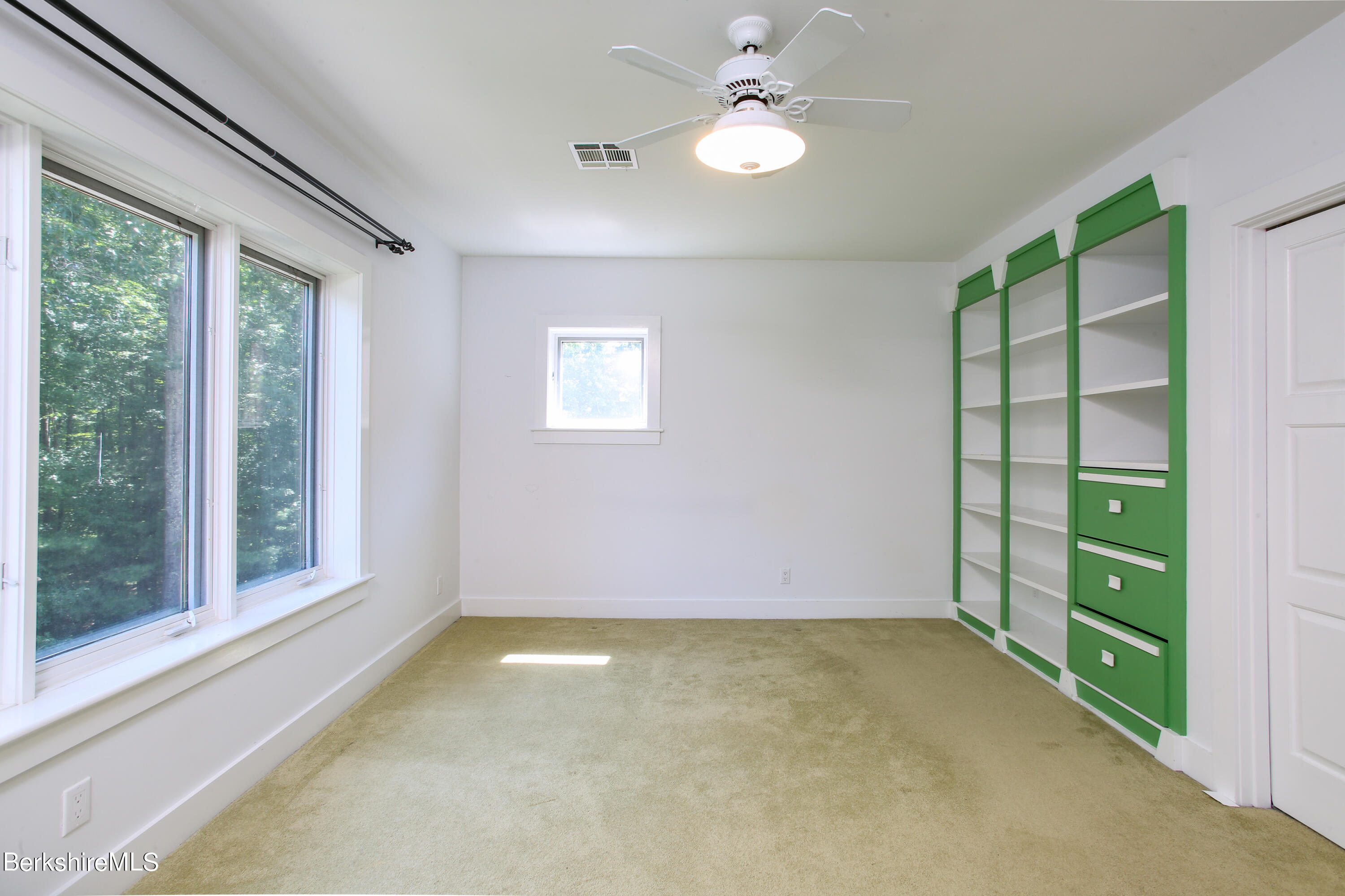 16 High Meadow Road Northampton, MA 01062 - Photo 22 of 49 a view of room with window and ceiling fan
