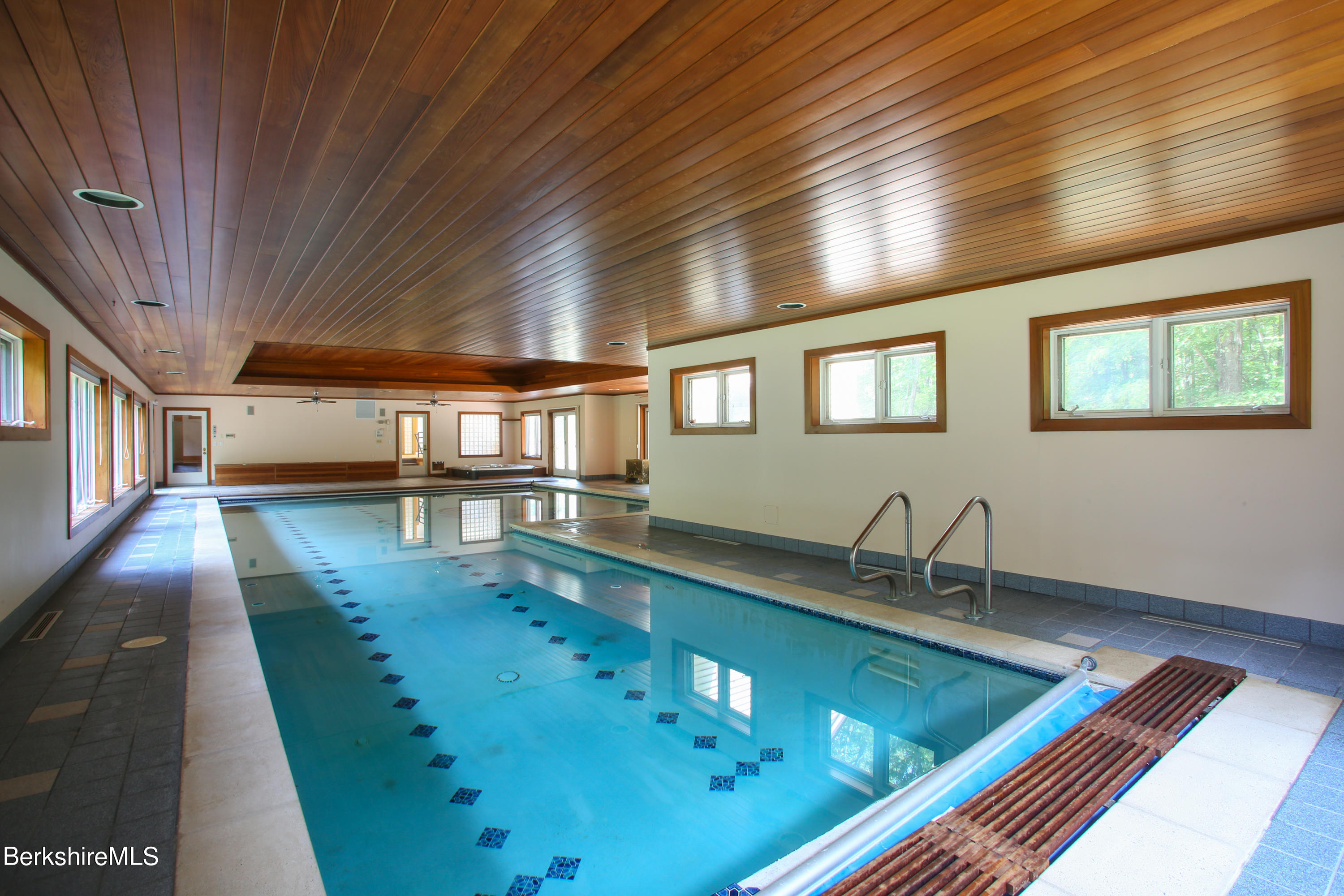 16 High Meadow Road Northampton, MA 01062 - Photo 33 of 49 a view of a swimming pool with a balcony