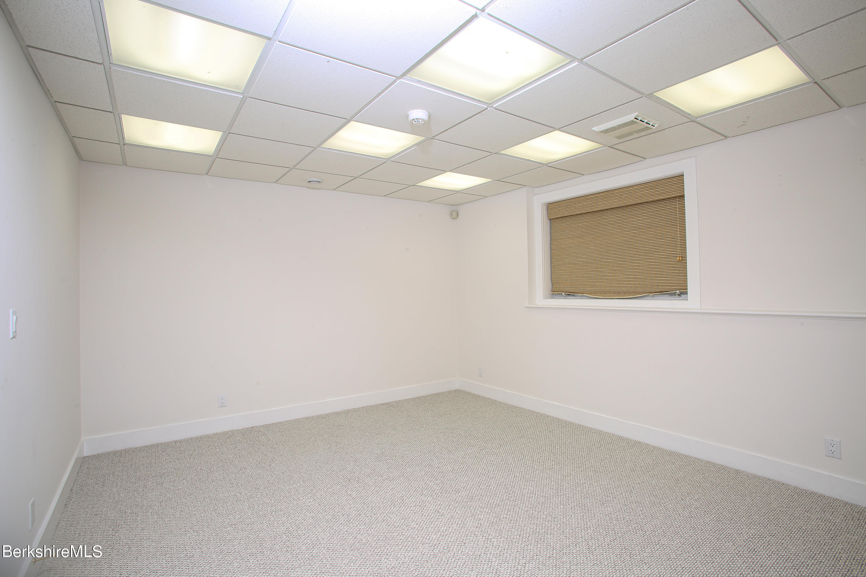 16 High Meadow Road Northampton, MA 01062 - Photo 39 of 49 an empty room with a empty space and a window