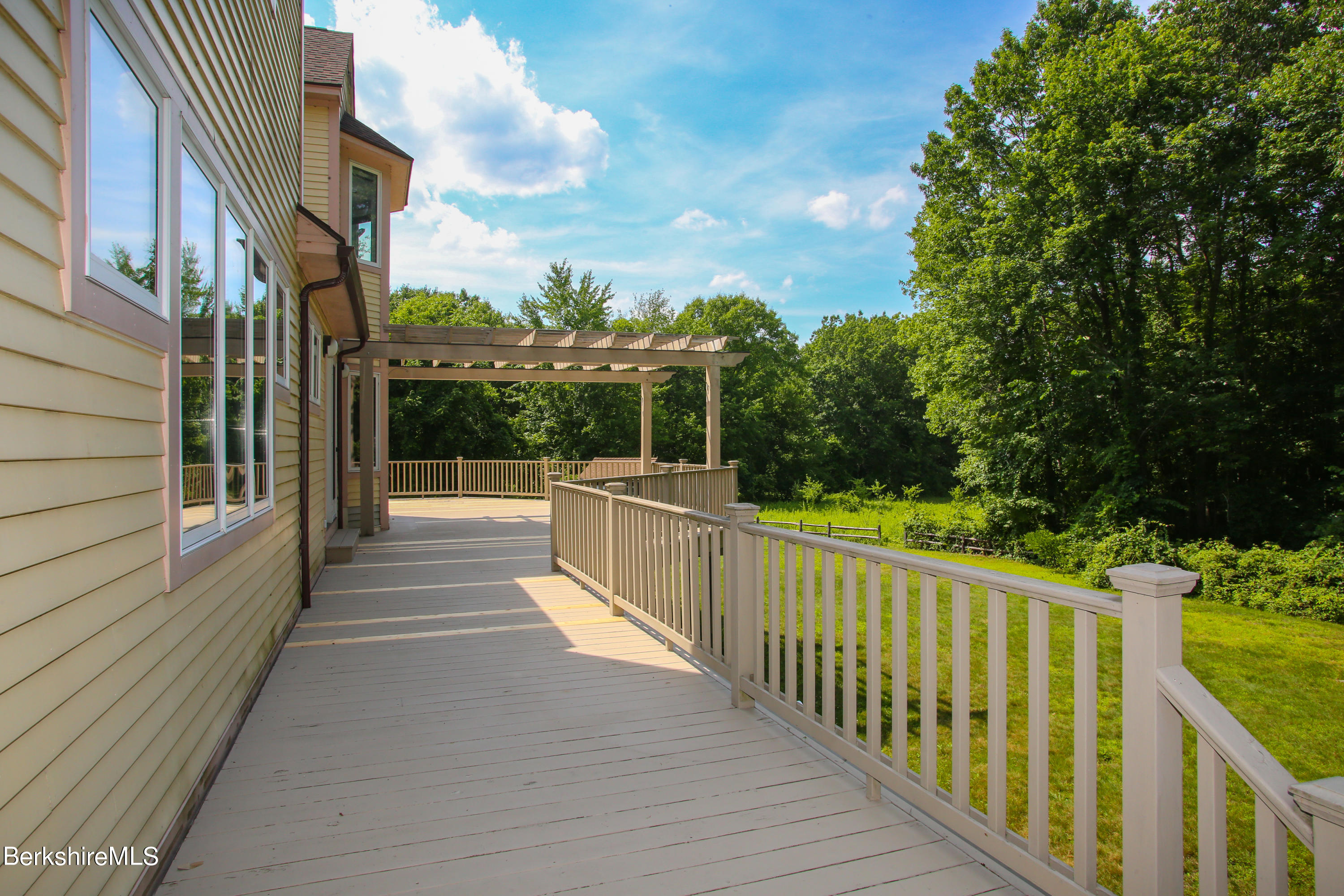 16 High Meadow Road Northampton, MA 01062 - Photo 43 of 49 a view of a balcony with wooden floor