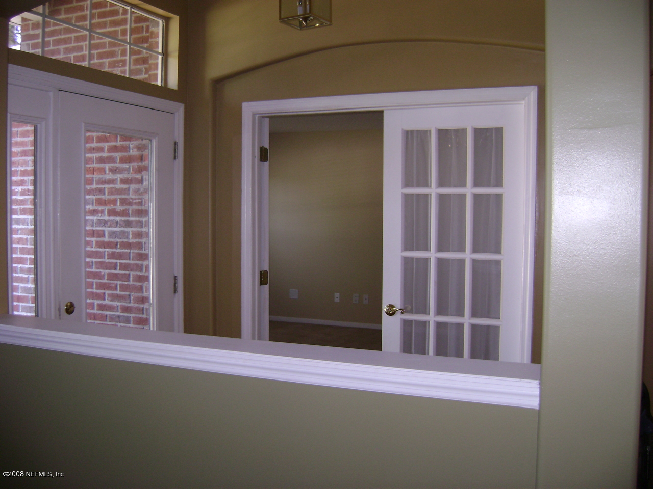 2451 Mallory Hills Road Jacksonville, FL 32221 - Photo 5 of 11 a view of a door of a house