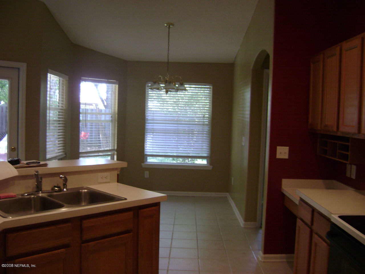 2451 Mallory Hills Road Jacksonville, FL 32221 - Photo 6 of 11 a bathroom with a sink a vanity and a bathtub