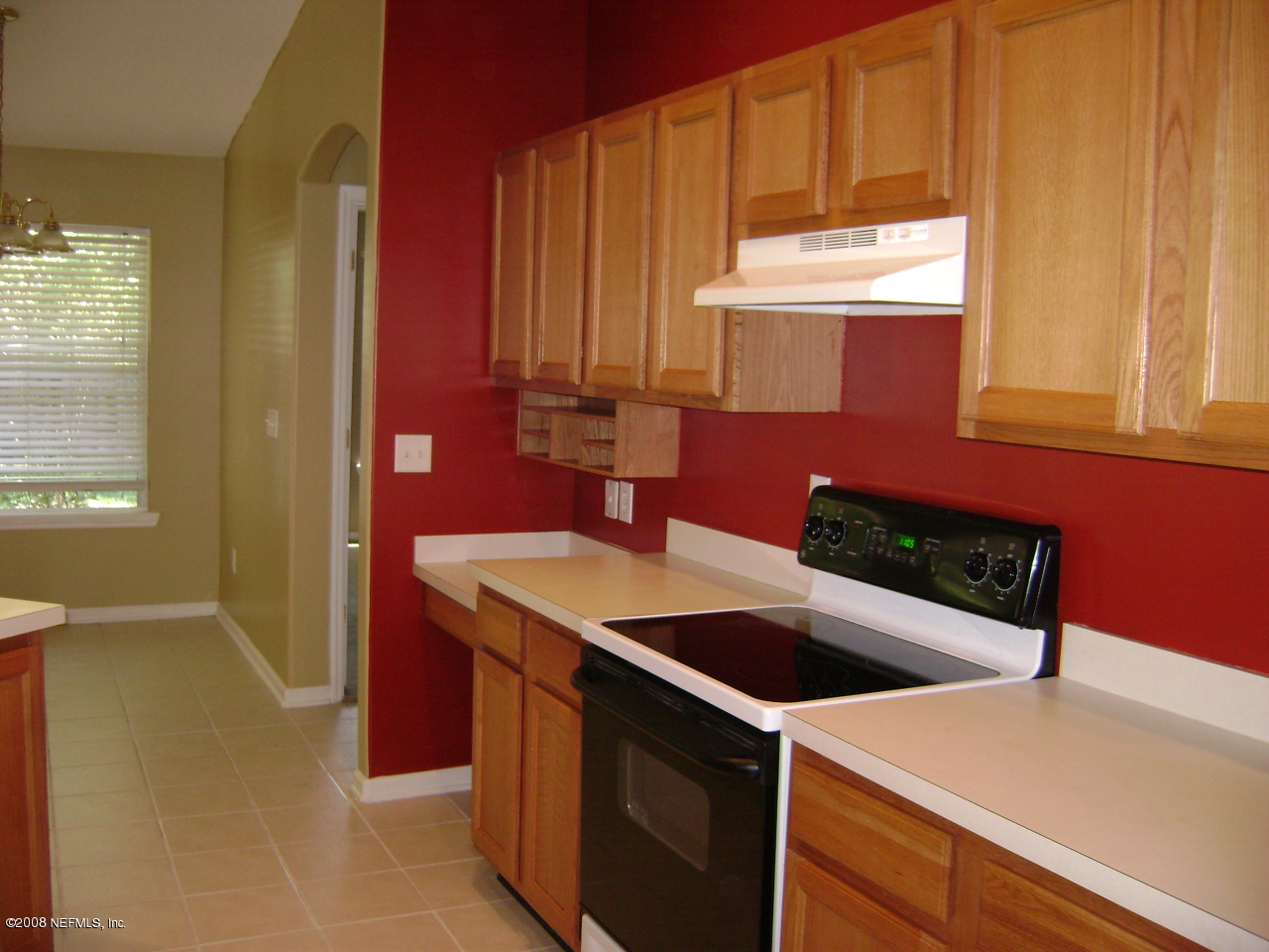2451 Mallory Hills Road Jacksonville, FL 32221 - Photo 7 of 11 a kitchen that has a sink and a stove