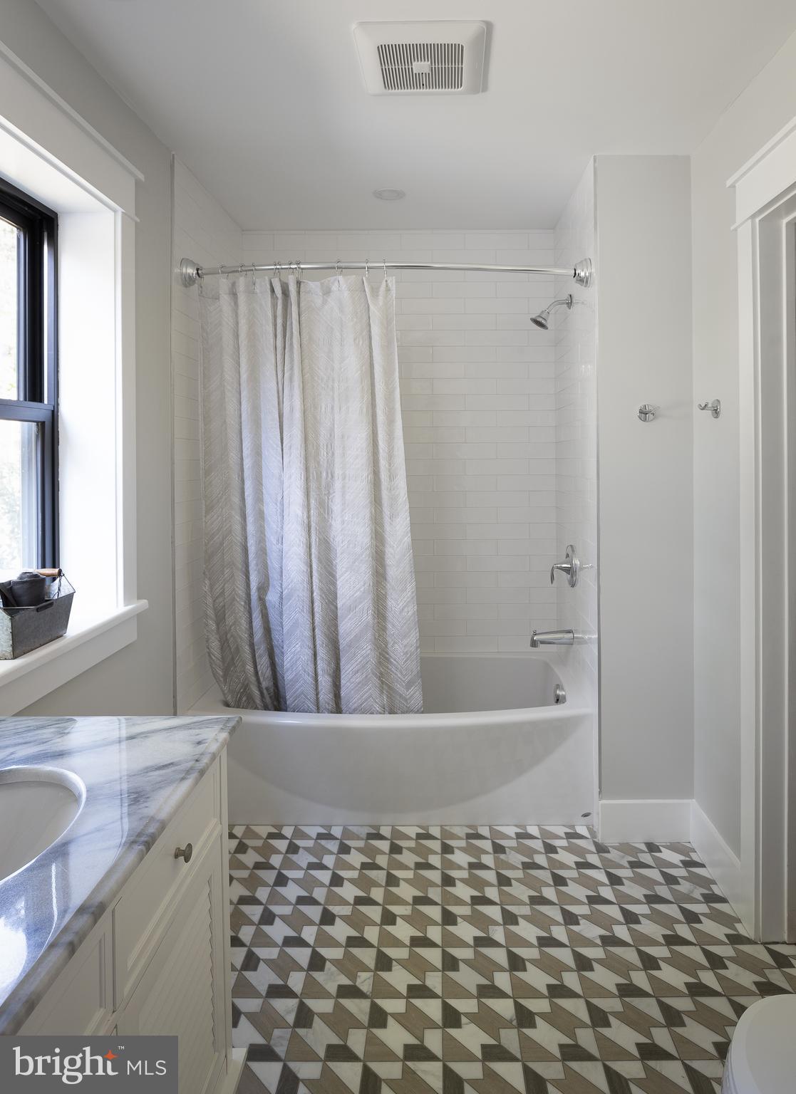 8 Hilltop Road Rose Valley, PA 19086 - Photo 30 of 51 Jack & Jill bath with radiant porcelain tile floor