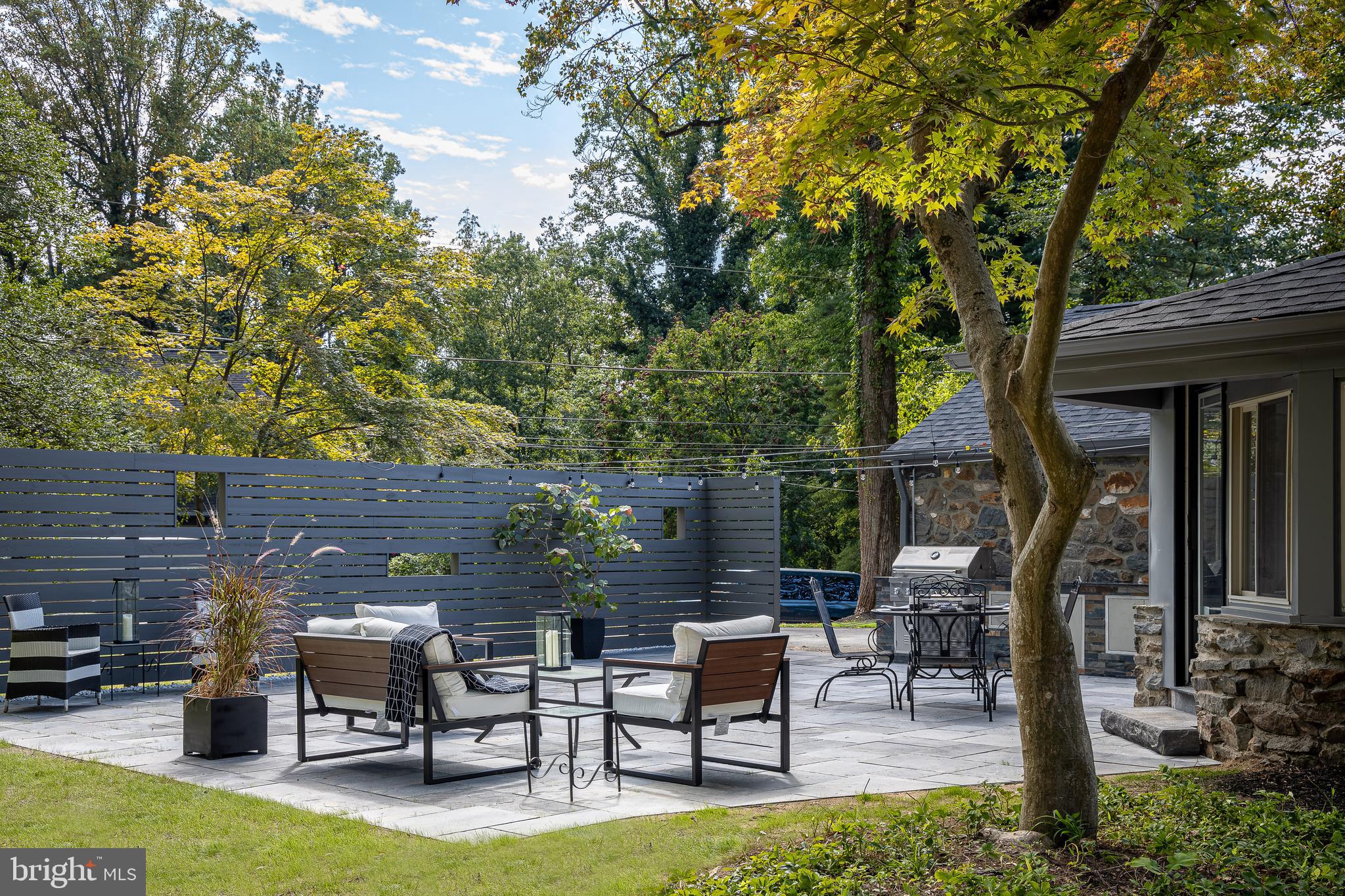 8 Hilltop Road Rose Valley, PA 19086 - Photo 46 of 51 Lovely patio with hand crafted privacy fence