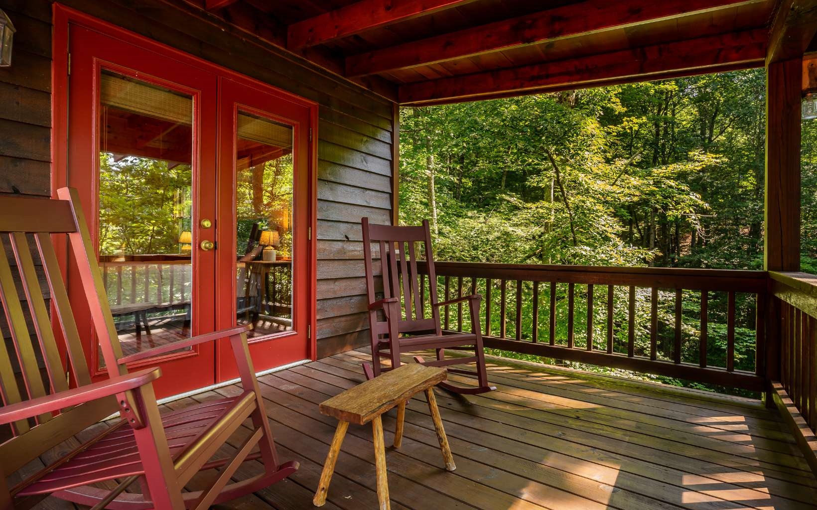 282 Papa Bear Path Cherry Log, GA 30522 - Photo 12 of 33 a view of balcony with chairs and wooden floor
