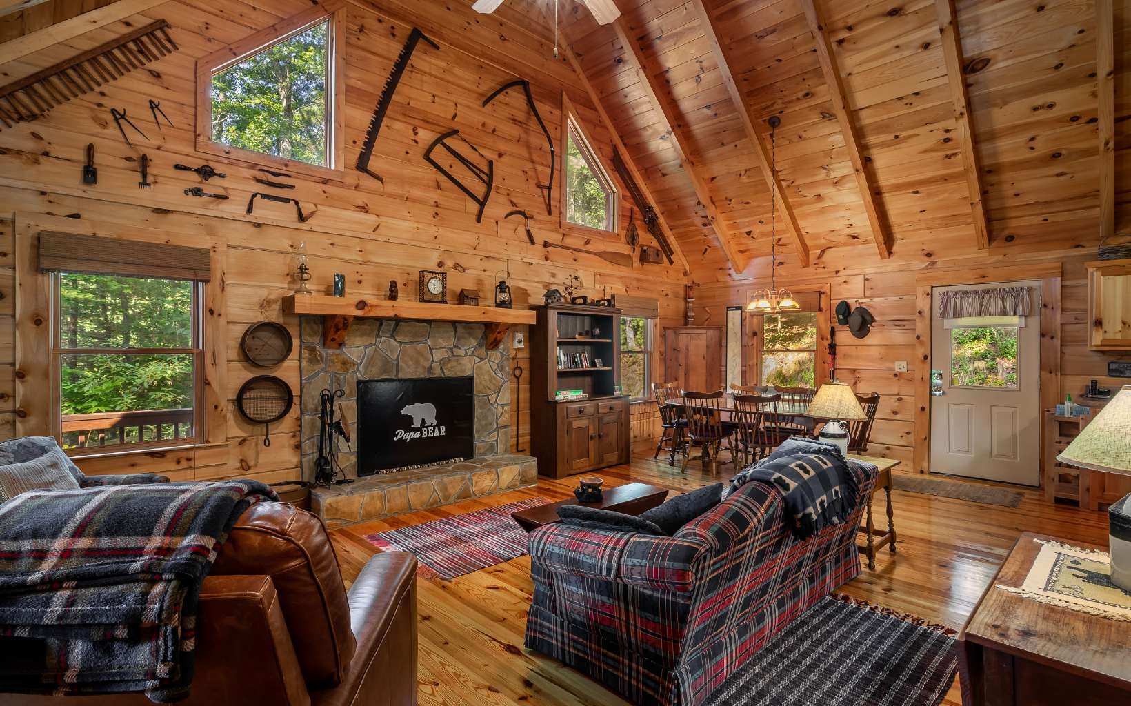 282 Papa Bear Path Cherry Log, GA 30522 - Photo 17 of 33 a living room with furniture a fireplace and a window