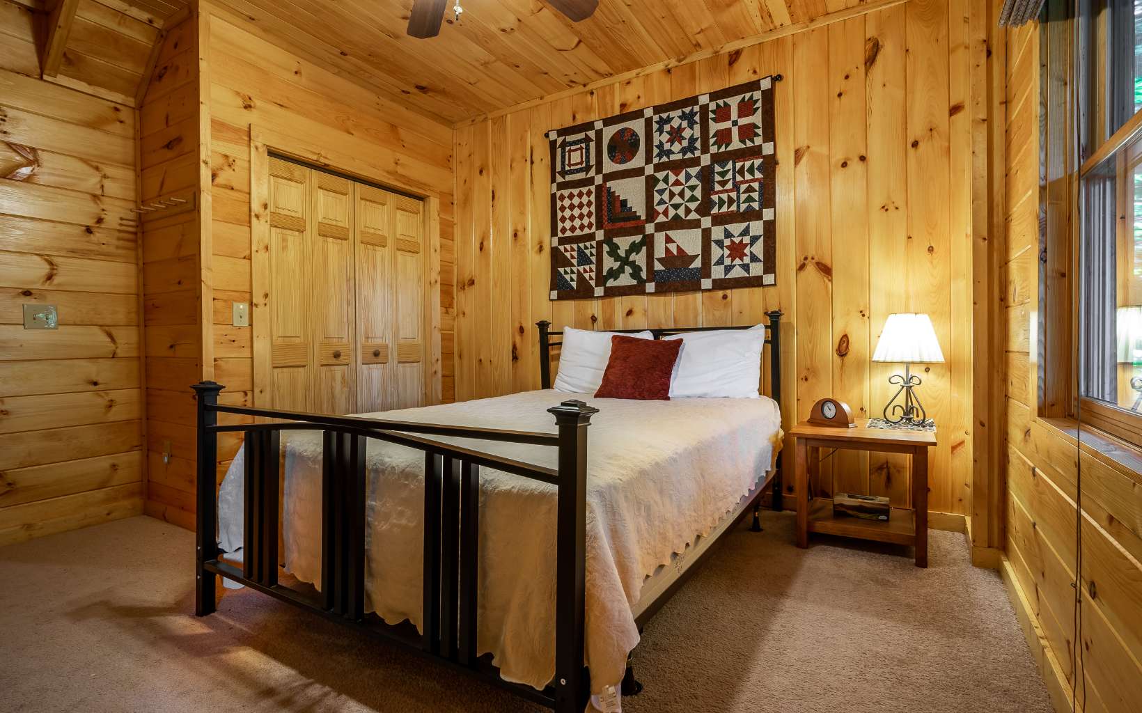 282 Papa Bear Path Cherry Log, GA 30522 - Photo 27 of 33 a bedroom with a bed and a window