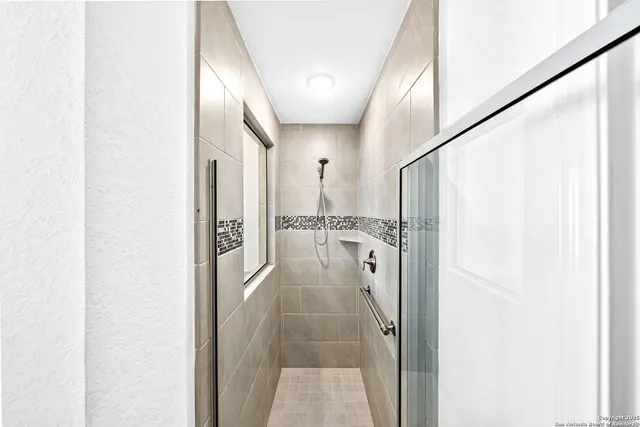 a view of small space with racks on the wall