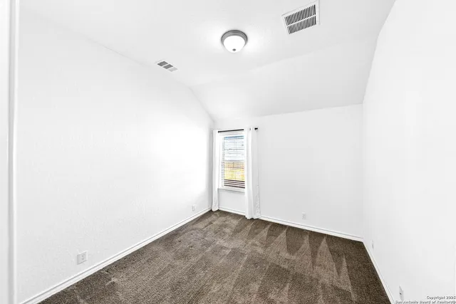 a bathroom with a sink vanity and a mirror